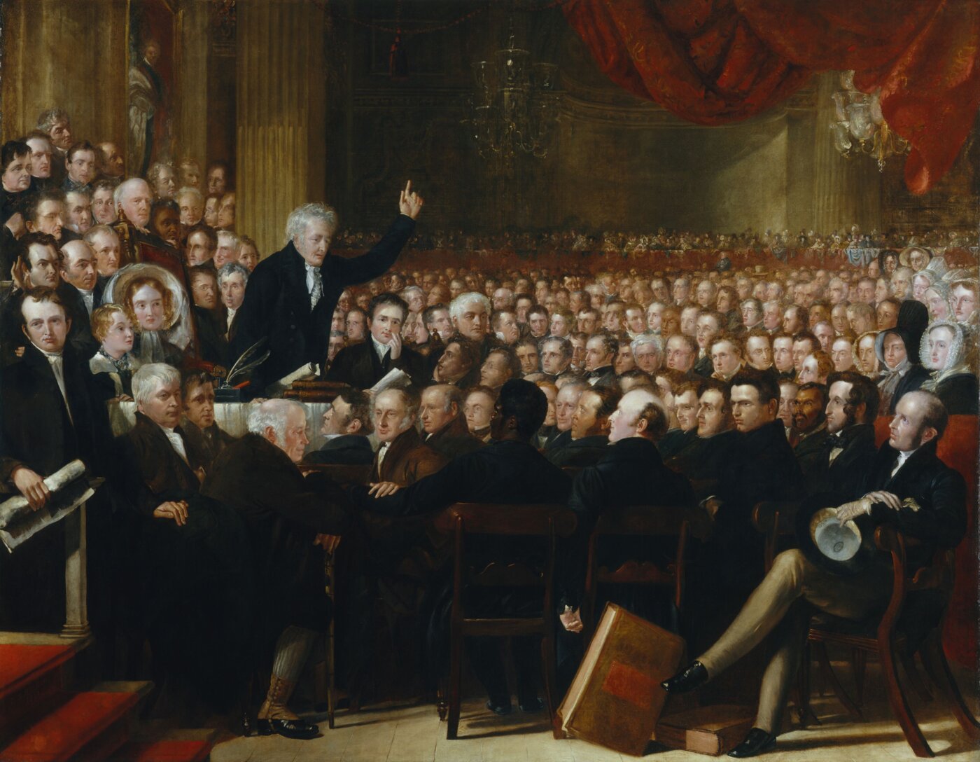 Painting of a large crowd of people framed by red curtains with one man speaking at the fore.