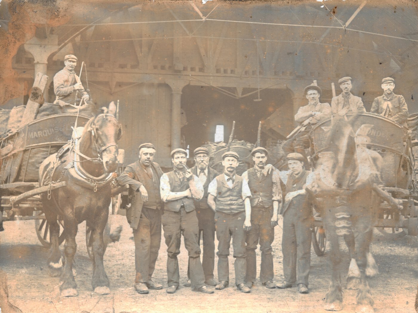 Group of Workmen (Including William Ivens Craft) with Two Horse-Drawn Carts.