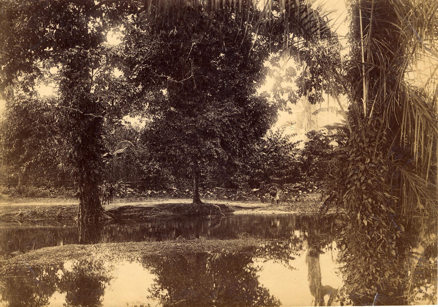 Forest scene: river in foreground, children and adult on path along river bank.