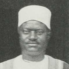 Head and shoulders portrait of Apolo Kagwa.