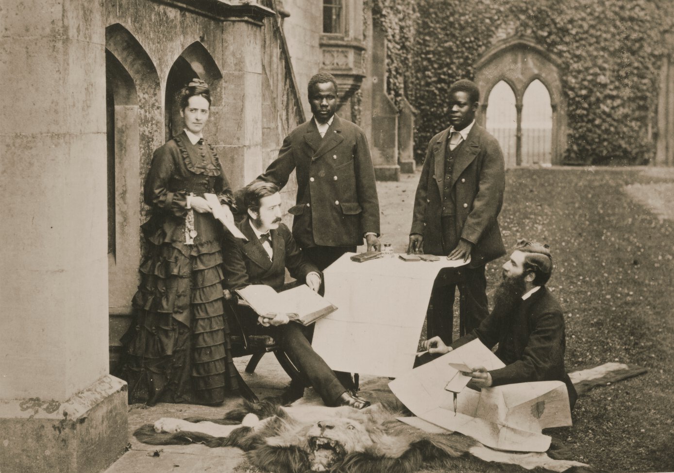 Agnes Livingstone, Thomas Livingstone, Abdullah Susi, James Chuma, Horace Waller with manuscripts.