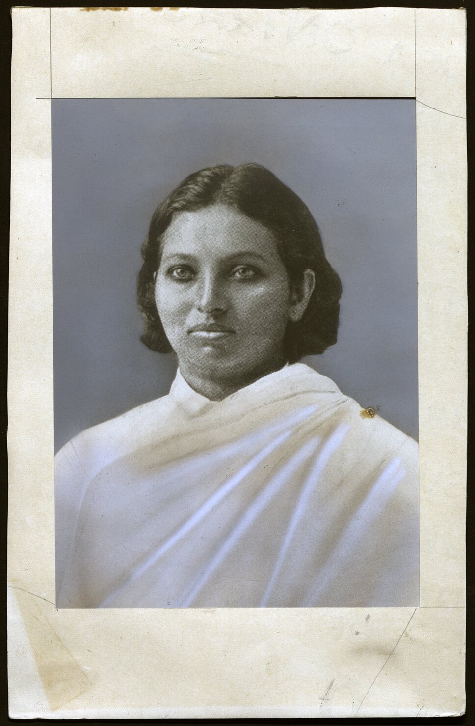 Head and shoulders portrait of Pandita Ramabai Sarasvati with paper border.
