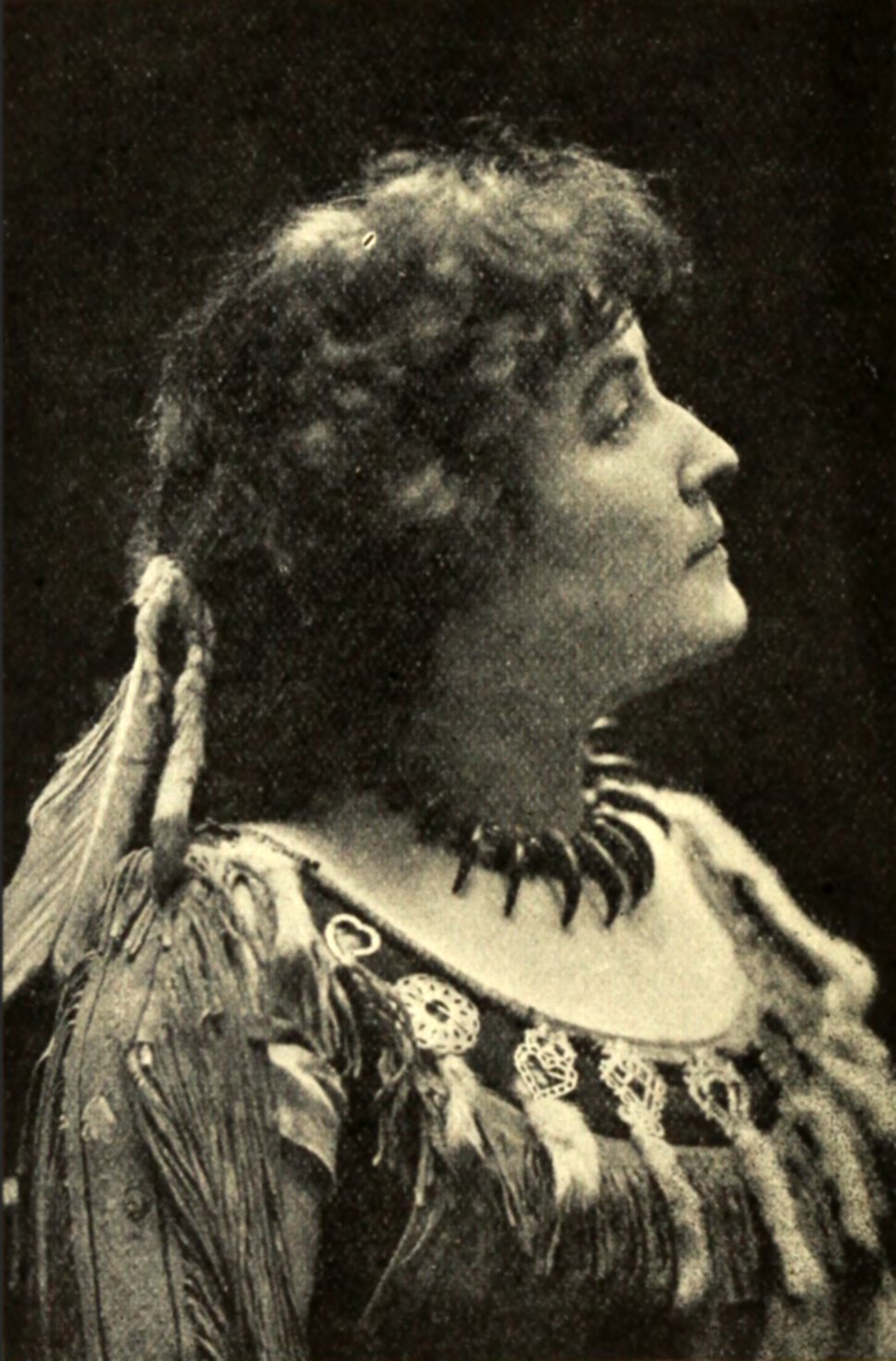Head and shoulders portrait of E. Pauline Johnson, facing left.