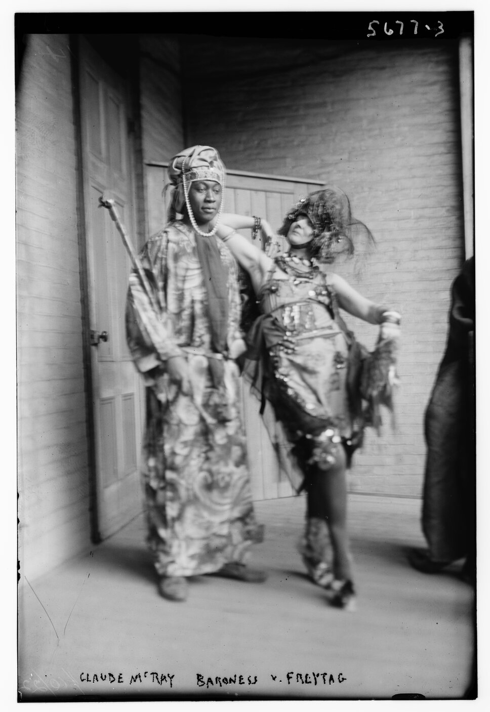 Claude McKay and Baroness Von Freytag-Loringhoven in elaborate costumes.