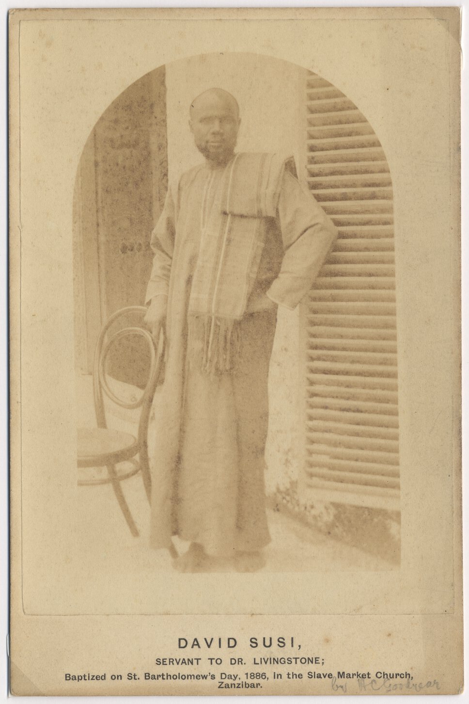 Abdullah Susi in traditional East African clothing, standing with body turned right, facing forward.