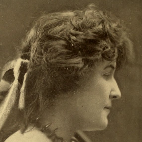 Head and shoulders portrait of E. Pauline Johnson, facing to her left.