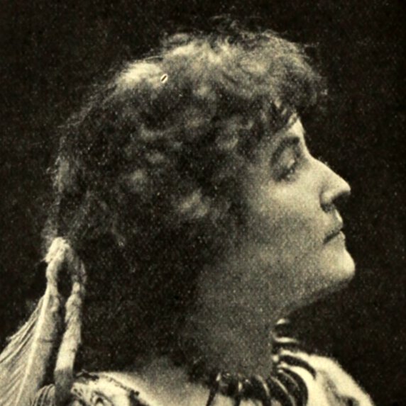 Head and shoulders portrait of E. Pauline Johnson, facing to her left and upward.