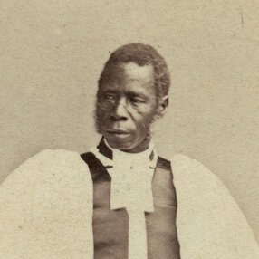 Samuel Ajayi Crowther in formal church attire, standing, facing slightly right.