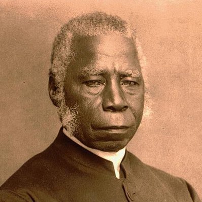 Samuel Ajayi Crowther, seated, in quarter profile turned to his left but facing forward.